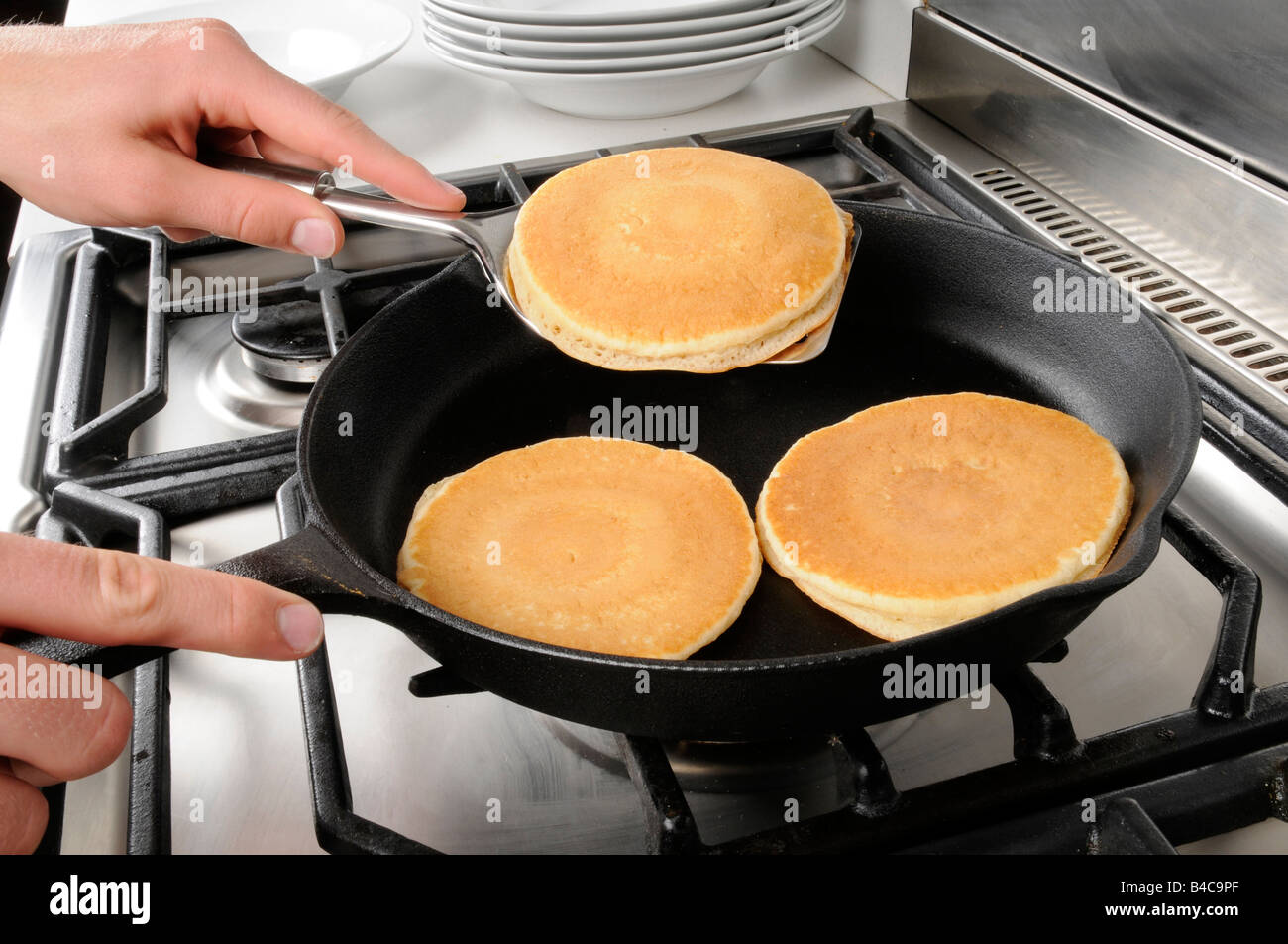 COOKING PANCAKES OR HOTCAKES Stock Photo