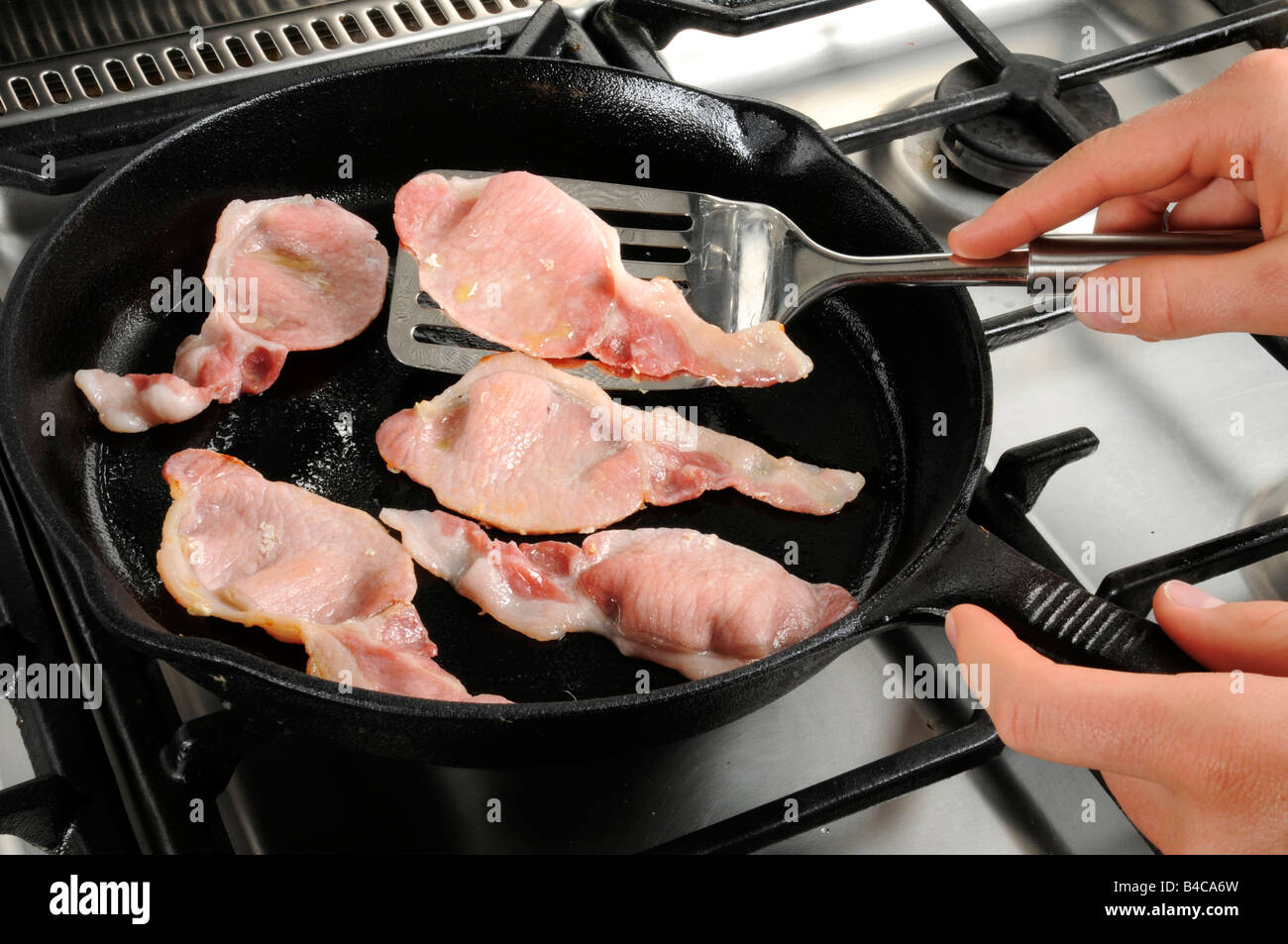 COOKING BACON Stock Photo