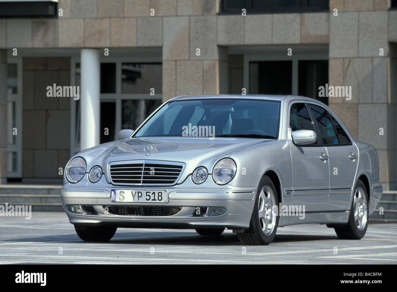 Car, Mercedes E class, Limousine, upper middle-sized , model year 1999-2001,  silver, standing, upholding, diagonal from the fron Stock Photo - Alamy