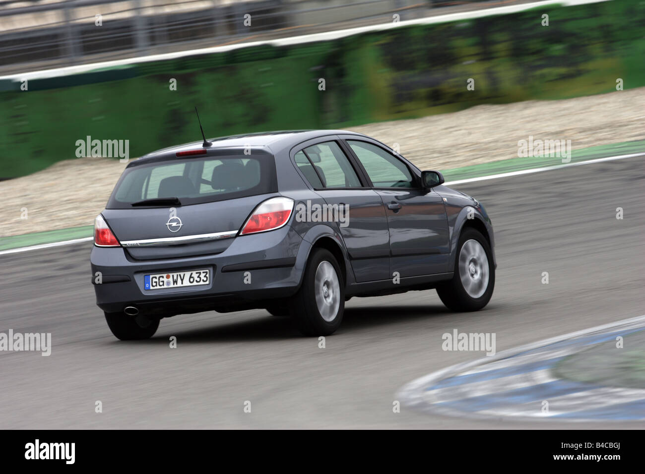 Car, Opel Astra 2.0 Turbo Sport, model year 2005-, anthracite, Limousine,  Lower middle-sized class, driving, diagonal from the b Stock Photo - Alamy