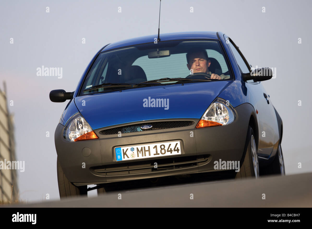 Car, Ford KA Student, model year 2004-, blue, Limousine, Miniapprox.s, driving, diagonal from the front, frontal view, photograp Stock Photo