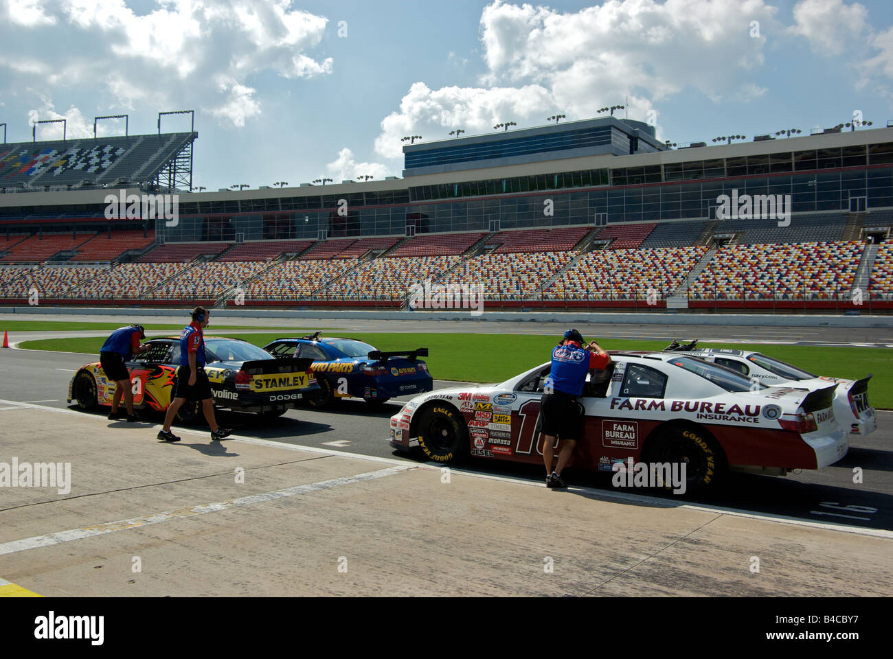 Richard Petty Driving Experience NASCAR style racecars on pit lane at Lowe's Motor Speedway Stock Photo