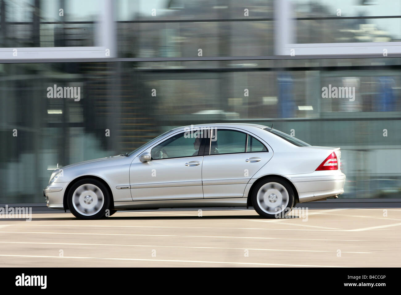 Car, Mercedes C 220 CDI, model year 2005-, silver, medium class, Limousine,  driving, side view, City, photographer: Hans Dieter Stock Photo - Alamy