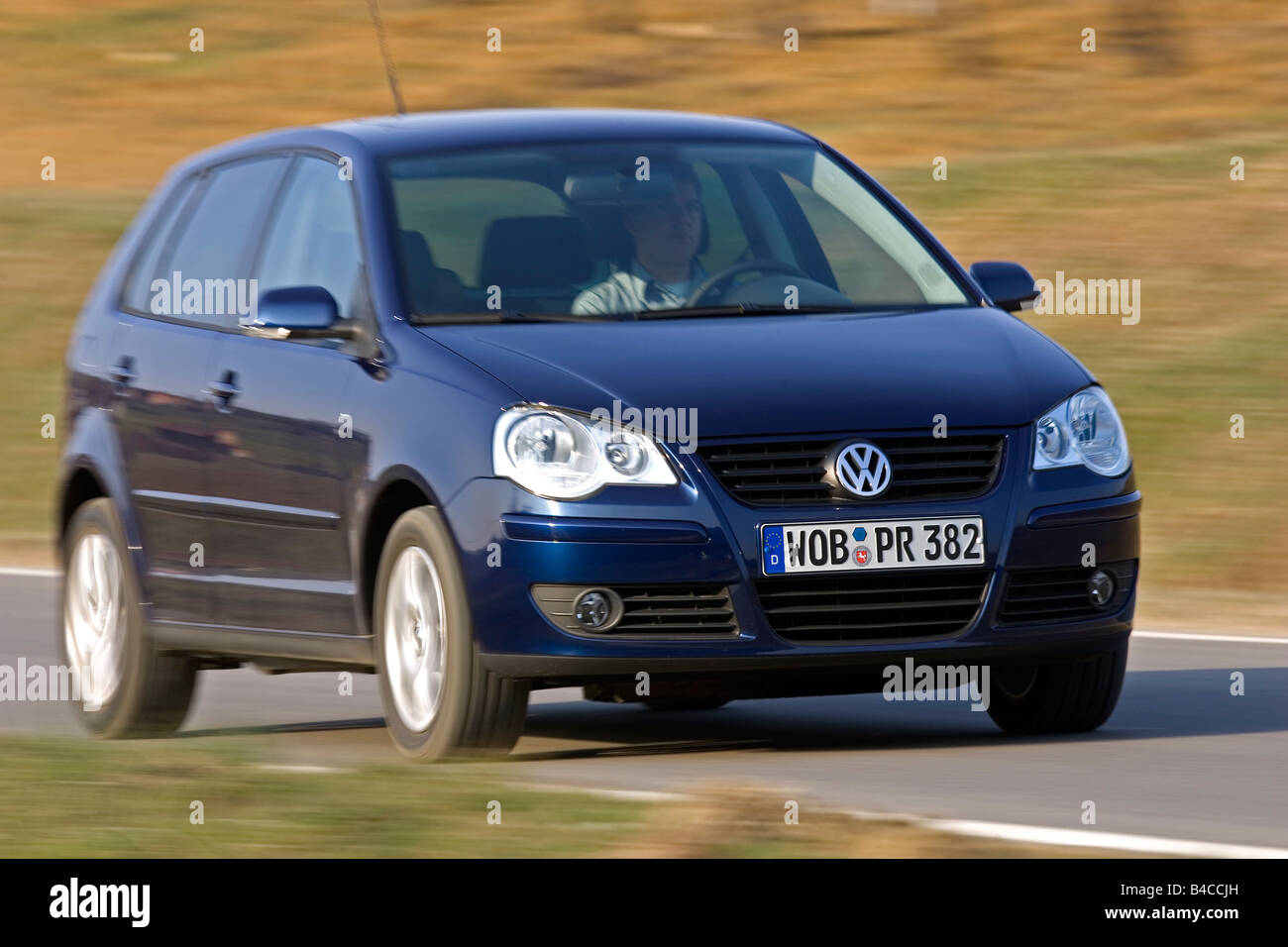 Car, VW Volkswagen Polo 1.9 TDI, model year 2005-, dark blue, small  approx., Limousine, driving, diagonal from the front, fronta Stock Photo -  Alamy