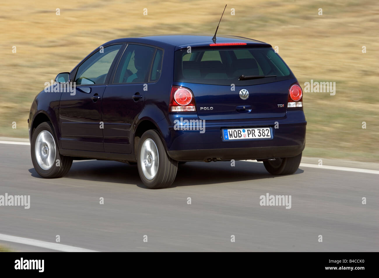 Car, VW Volkswagen Polo 1.9 TDI, model year 2005-, dark blue, small  approx., Limousine, driving, diagonal from the back, rear vi Stock Photo -  Alamy