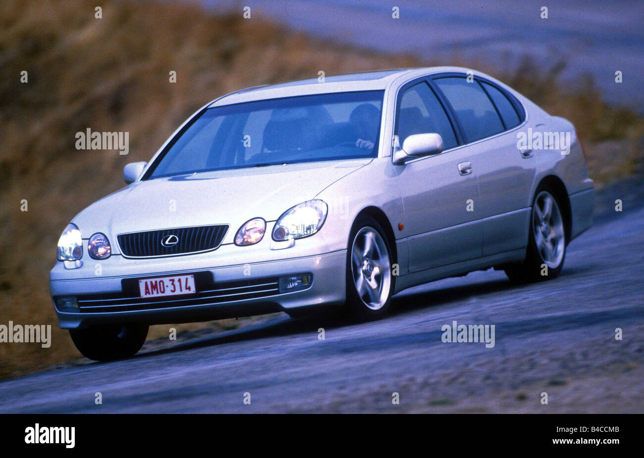 Car, Lexus GS 430, Limousine, upper middle-sized , model year 2000-, silver, driving, country road, diagonal from the front Stock Photo