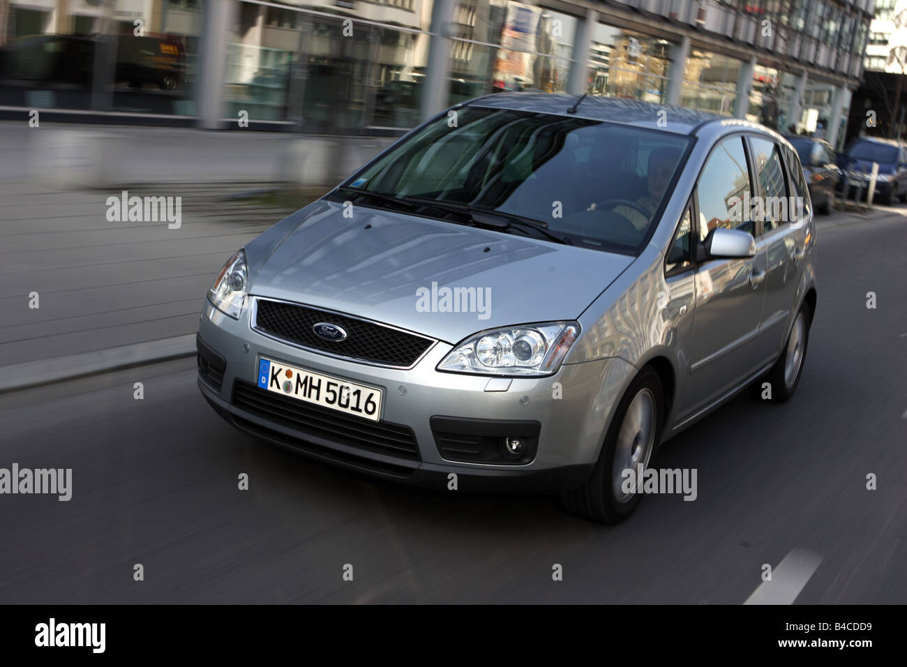 Car, Ford Focus C-Max 2.0 16V, Lower middle-sized class, model year 2005-, silver, driving, diagonal from the front, frontal vie Stock Photo
