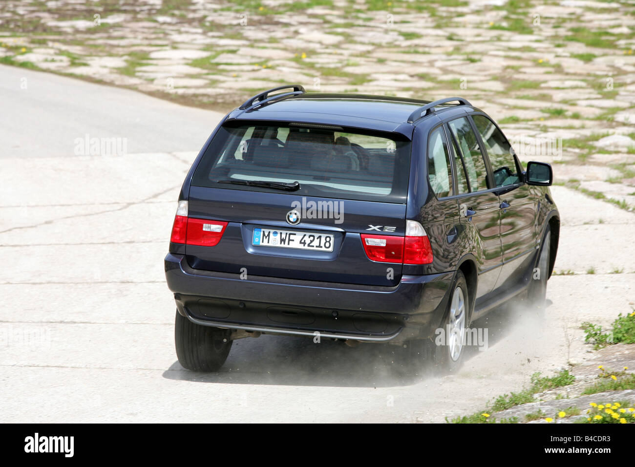 Car, BMW X5 3.0d, model year 2005-, black, cross country vehicle, driving,  diagonal from the back, rear view, photographer: Hans Stock Photo - Alamy