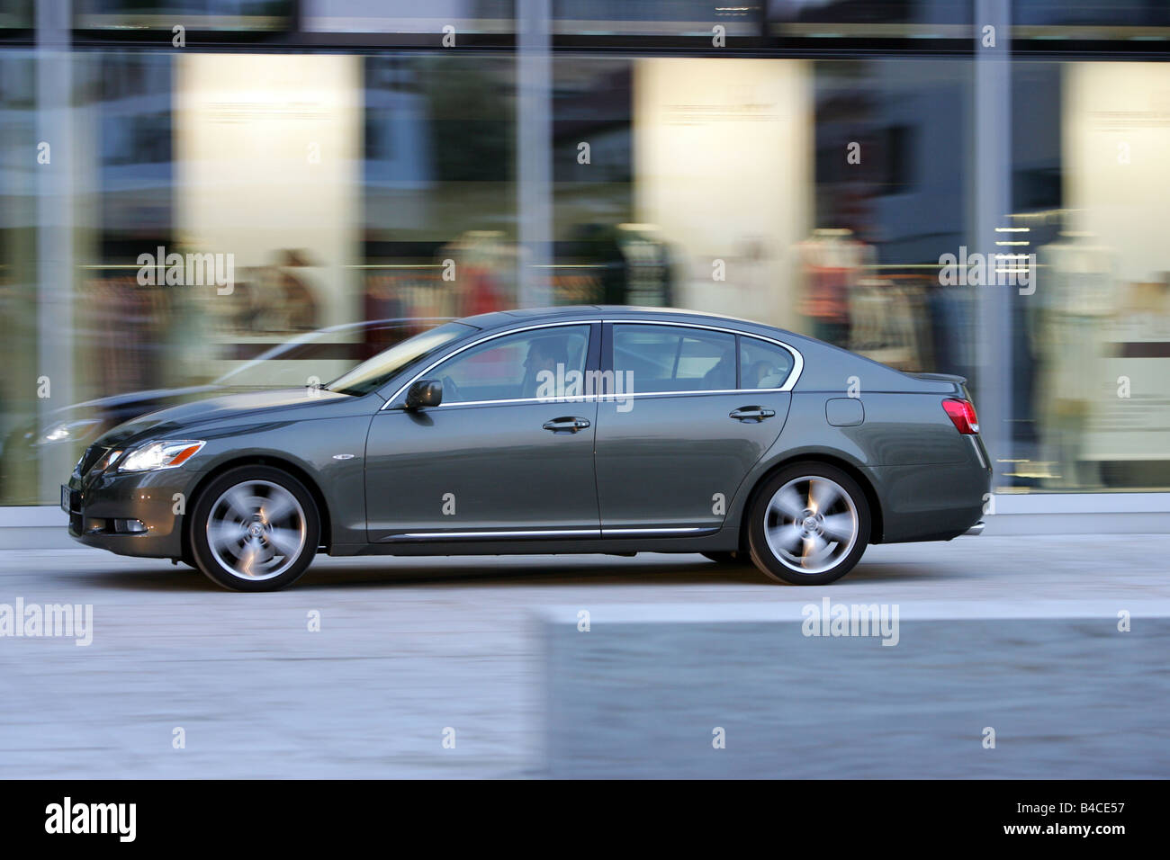 Car, Lexus GS 300, model year 2005-, silver-green, upper middle-sized , Limousine, driving, side view, City, photographer: Hans Stock Photo
