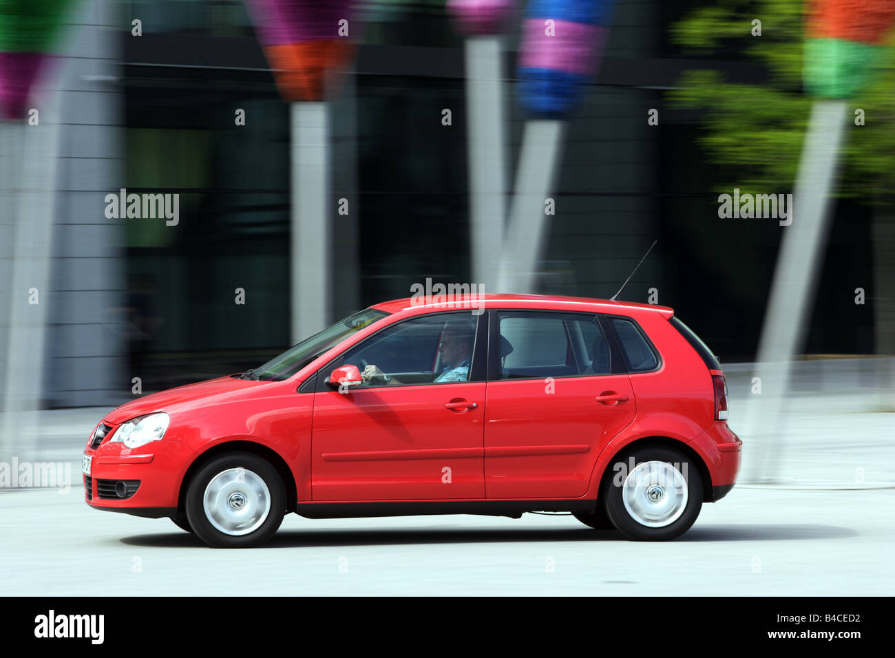 Car, VW Volkswagen Polo 1.4 TDI, model year 2005-, red, driving, side view,  City, photographer: Achim Hartmann Stock Photo - Alamy