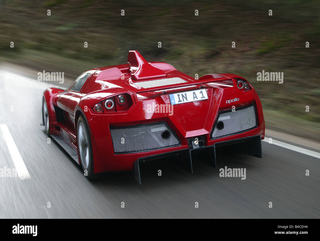 Car, Apollo, roadsters, sportsman, Gumpert, model year 2005, red, driving, diagonal from the back, rear view, country road, phot Stock Photo