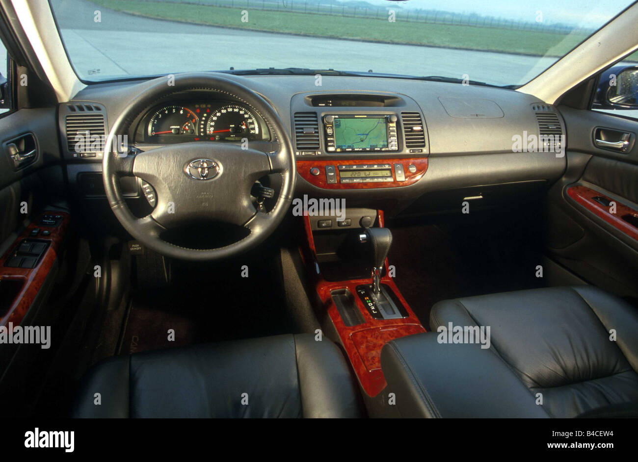 Car, Toyota Camry 3.0 V6, upper middle-sized , Limousine, model year 2002-,  dark blue, interior view, Interior view, Cockpit, te Stock Photo - Alamy