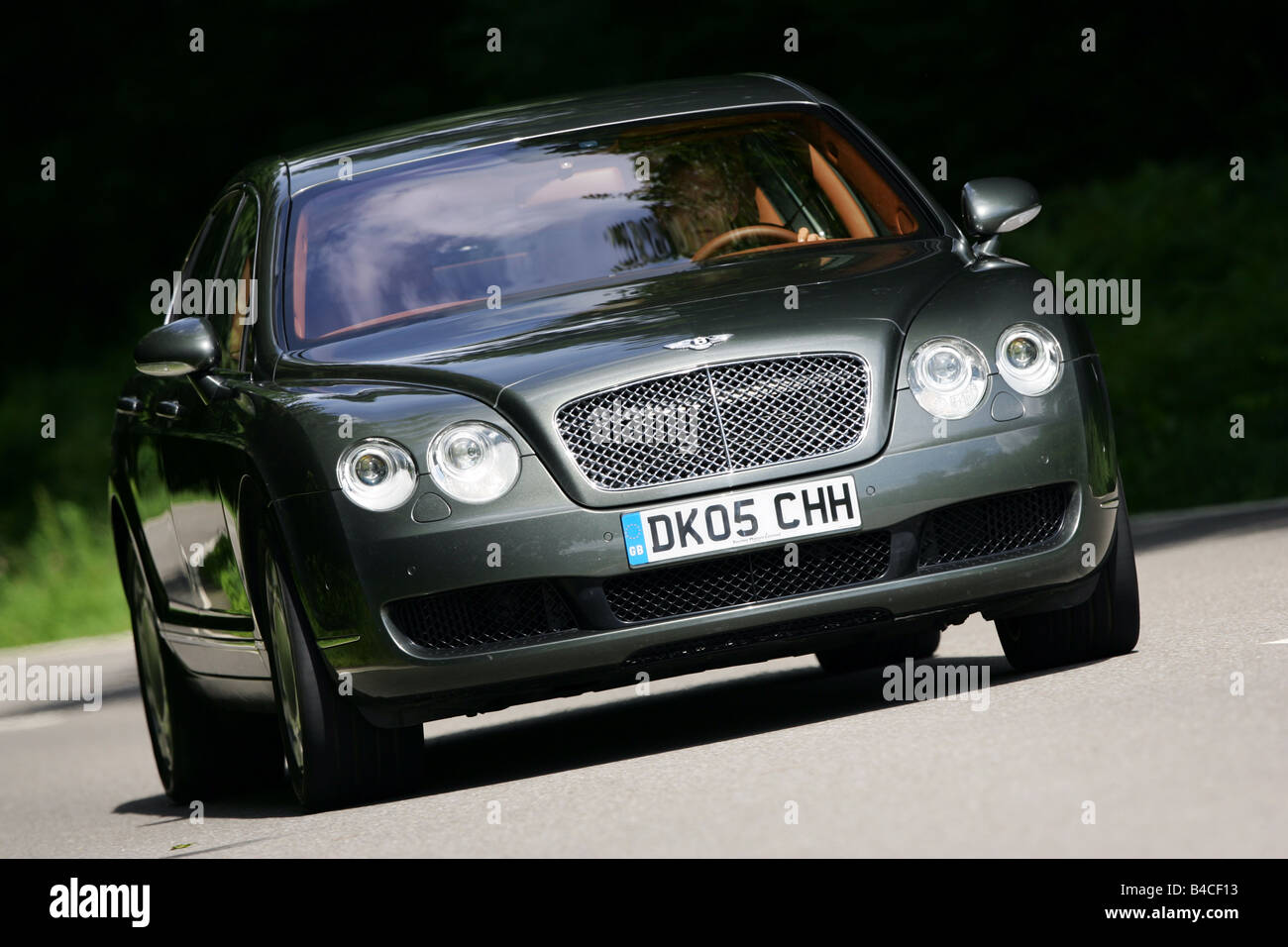 Car, Bentley Continental Flying Spur, anthracite, model year 2005-, driving, diagonal from the front, frontal view, country road Stock Photo