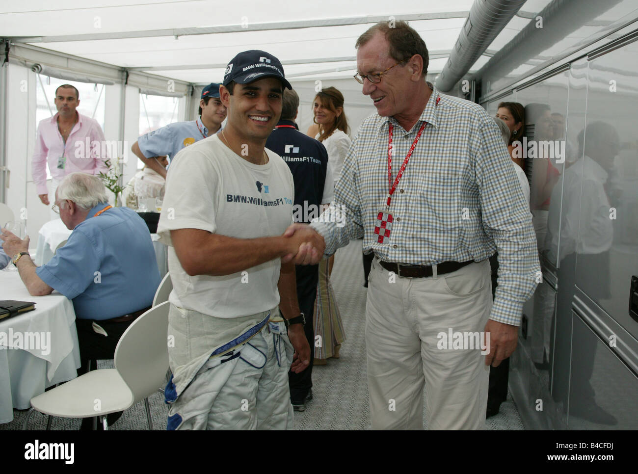 Daimler Chrysler chairman Jürgen Schrempp with Juan Pablo Montoya, VIP, Persons, Portrait Stock Photo