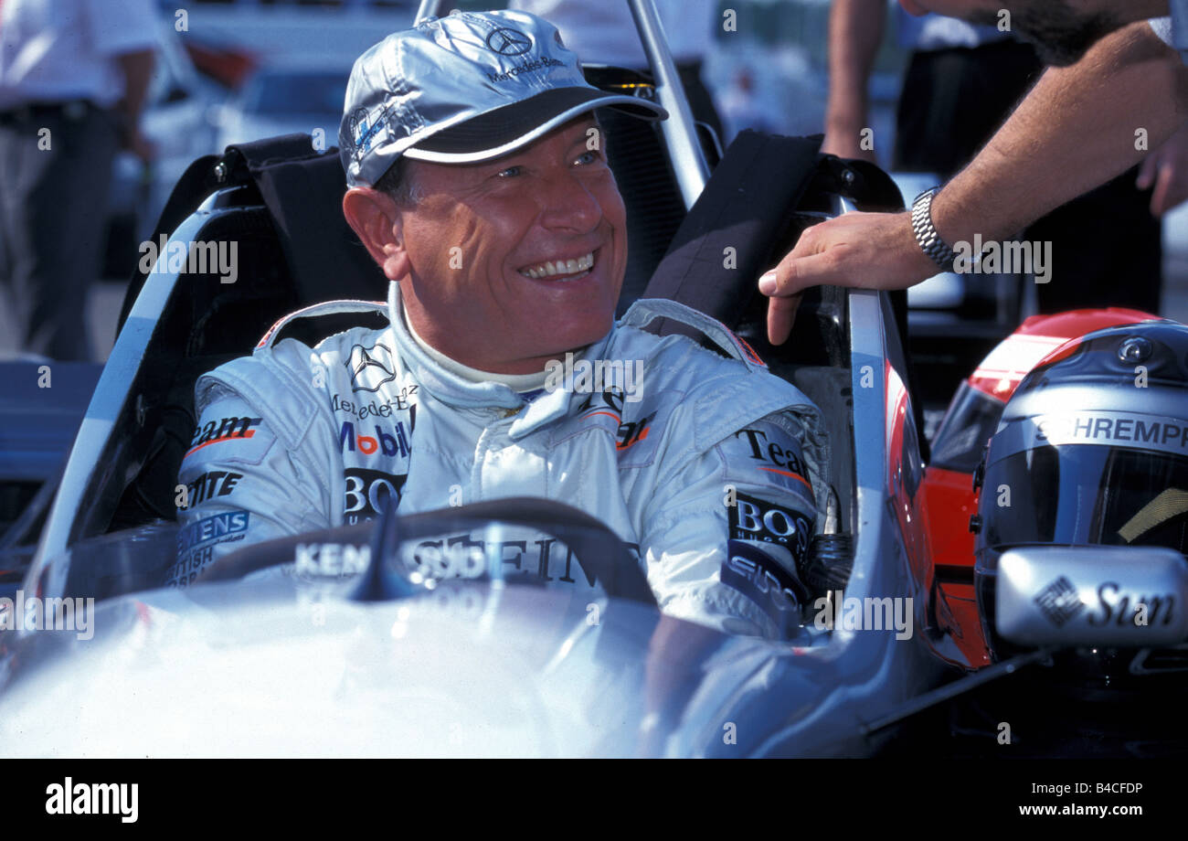 Daimler Chrysler chairman Jürgen Schrempp in the racing approx., F1 vehicles, VIP, Persons, Portrait Stock Photo