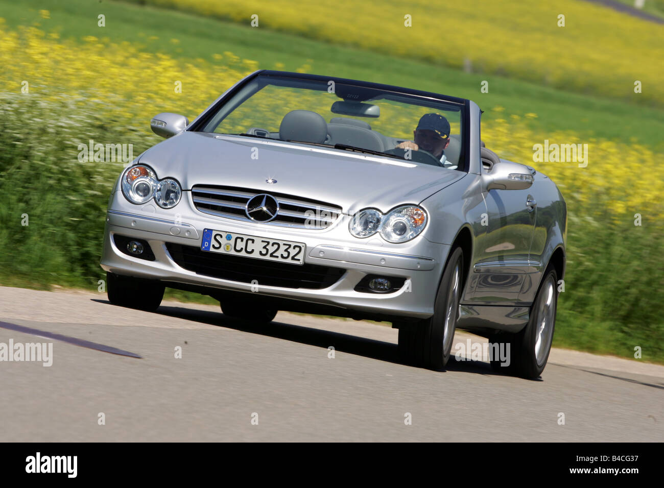 Mercedes CLK 320 CDI Convertible, model year 2005, silver, driving