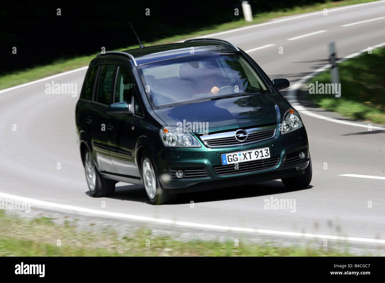 Car, Opel Zafira 1.9 CDTi, Van, model year 2005-, dark green, driving,  diagonal from the front, frontal view, country road Stock Photo - Alamy