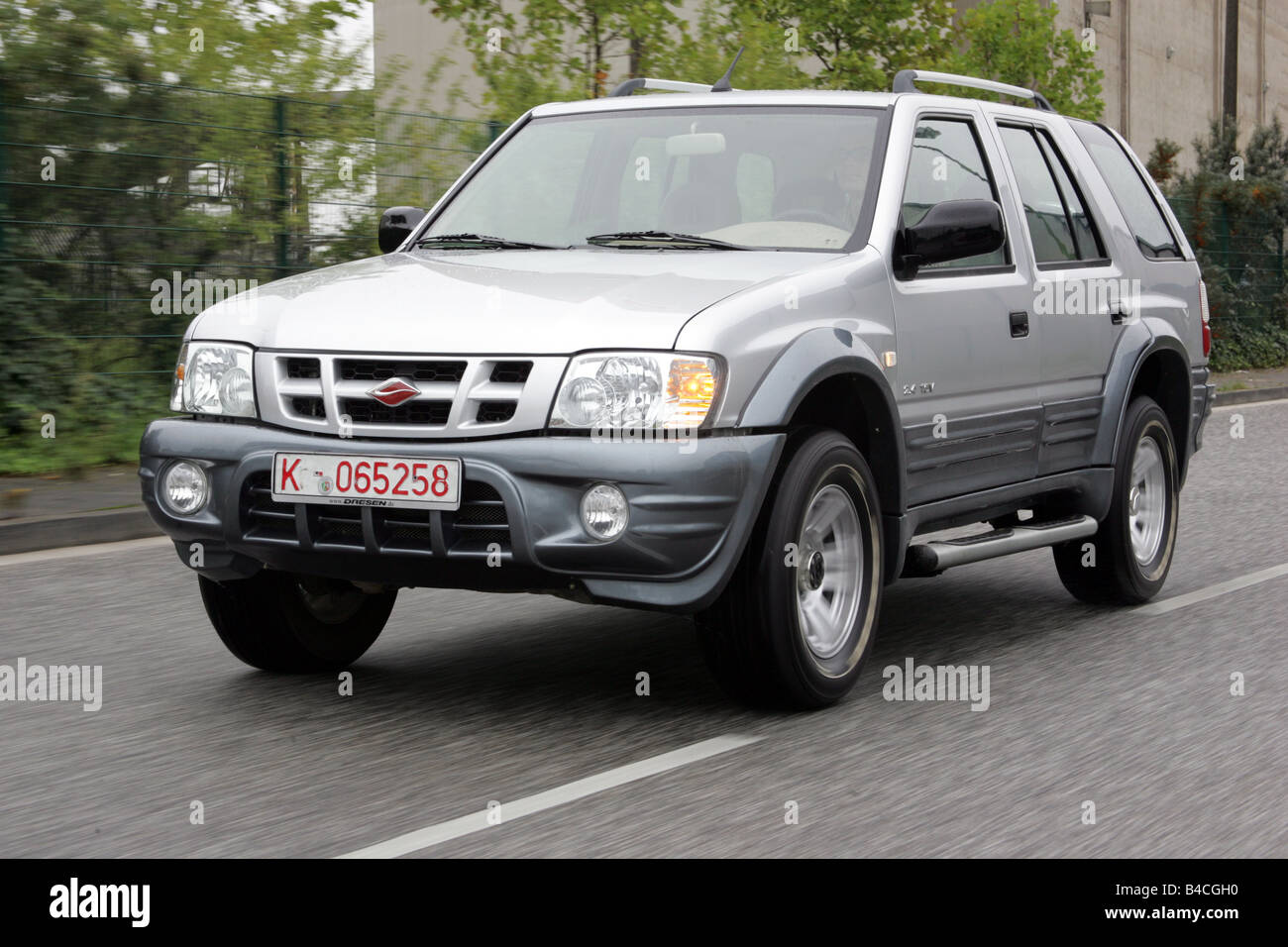 Car, Land breeze, cross country vehicle, model year 2005-, silver, driving, diagonal from the front, frontal view, City Stock Photo