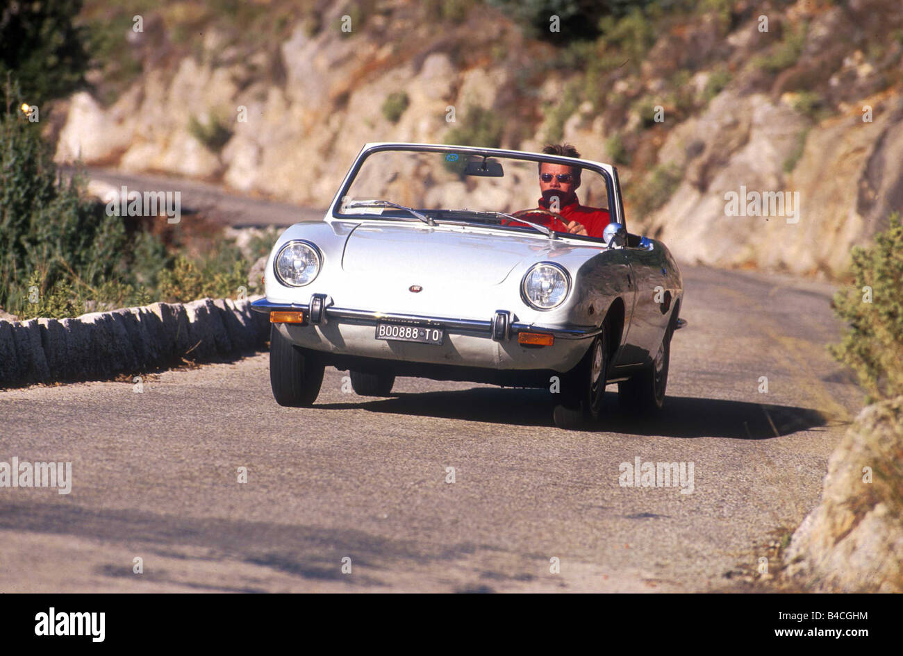 Car, Fiat 850 Spider, Convertible, Vintage approx., model year 1965-1972, sixties, white, driving, diagonal from the front, fron Stock Photo