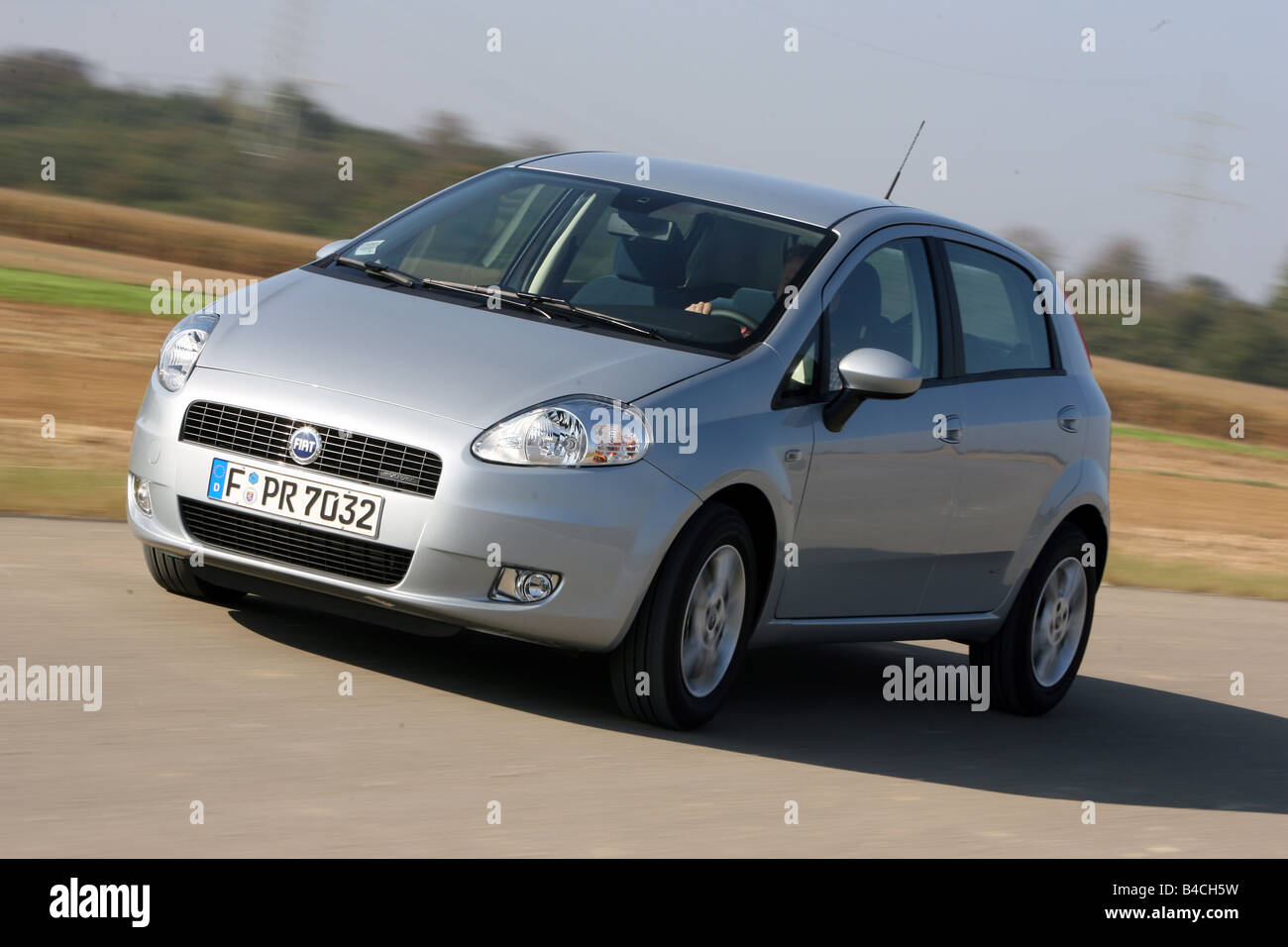 Fiat Grande Punto 1.3 Multijet 16V, model year 2005-, silver, driving,  diagonal from the front, frontal view, country road Stock Photo - Alamy
