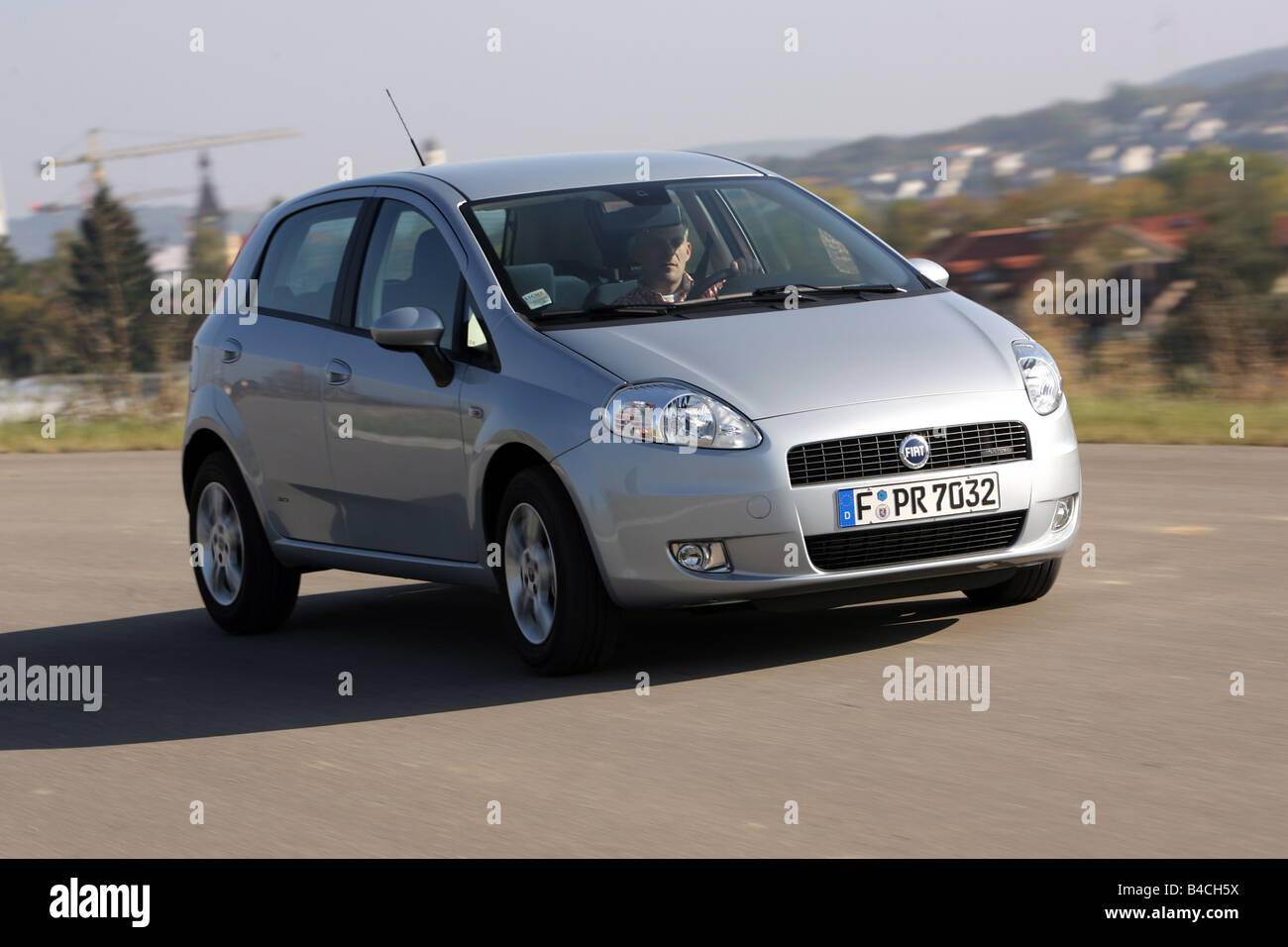 Fiat Grande Punto 1.3 Multijet 16V, model year 2005-, silver, driving,  diagonal from the front, frontal view, country road Stock Photo - Alamy