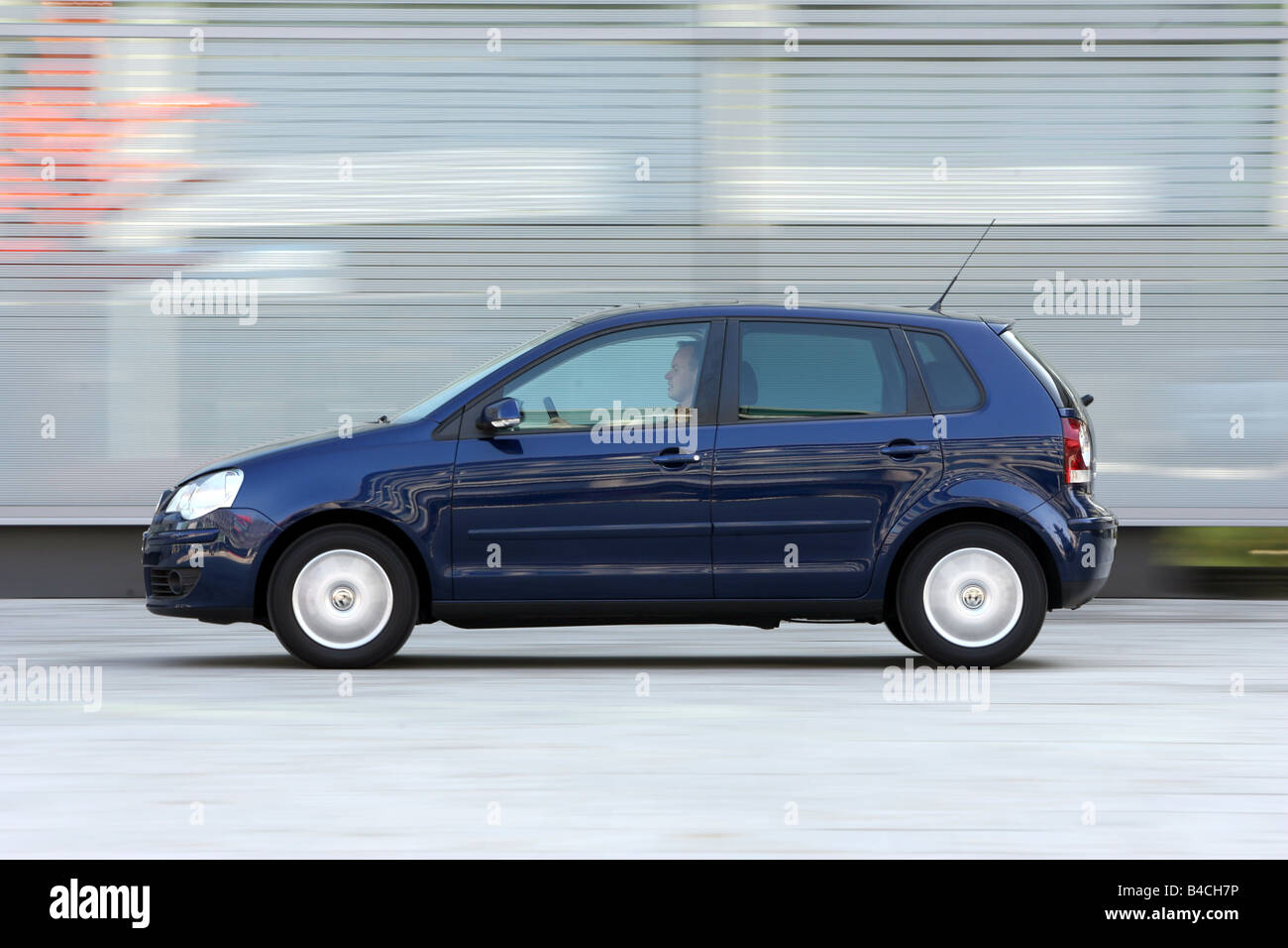 VW Volkswagen Polo 1.4 TDI, model year 2005-, dunkelblue moving, side view,  City Stock Photo - Alamy