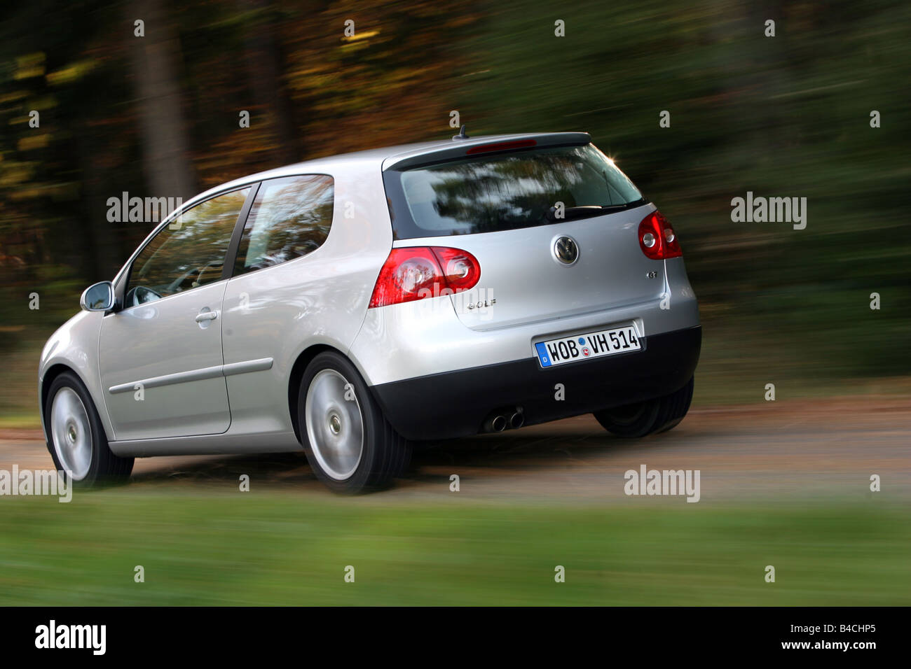 VW Volkswagen Golf GT, Golf V, model year 2005-, silver, driving, diagonal  from the back, rear view, side view, country road, Au Stock Photo - Alamy