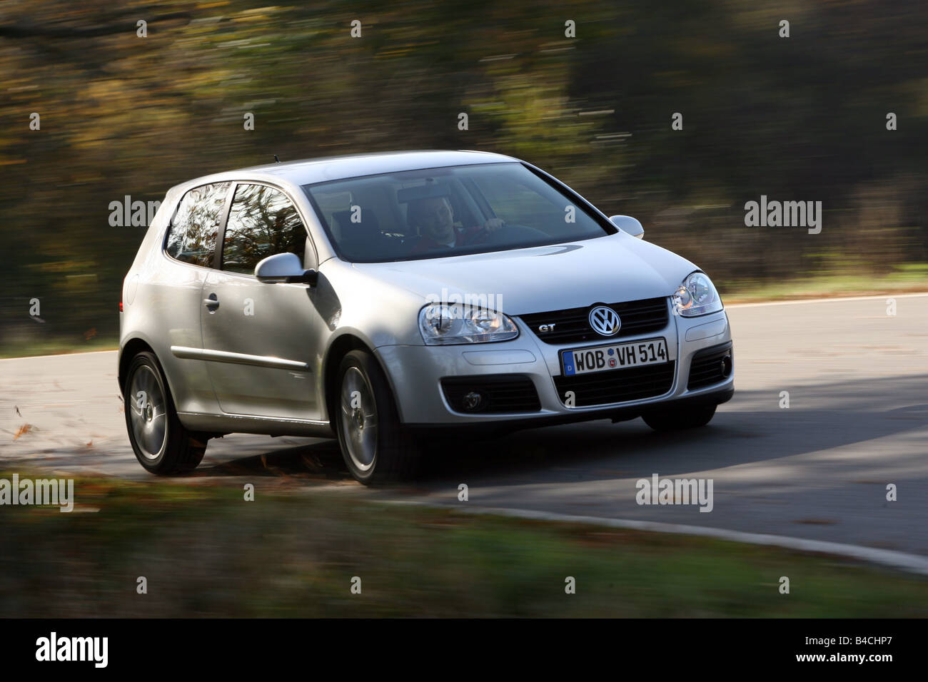VW Volkswagen Golf GT, Golf V, model year 2005-, silver, driving, diagonal  from the front, frontal view, country road, Autumn Stock Photo - Alamy