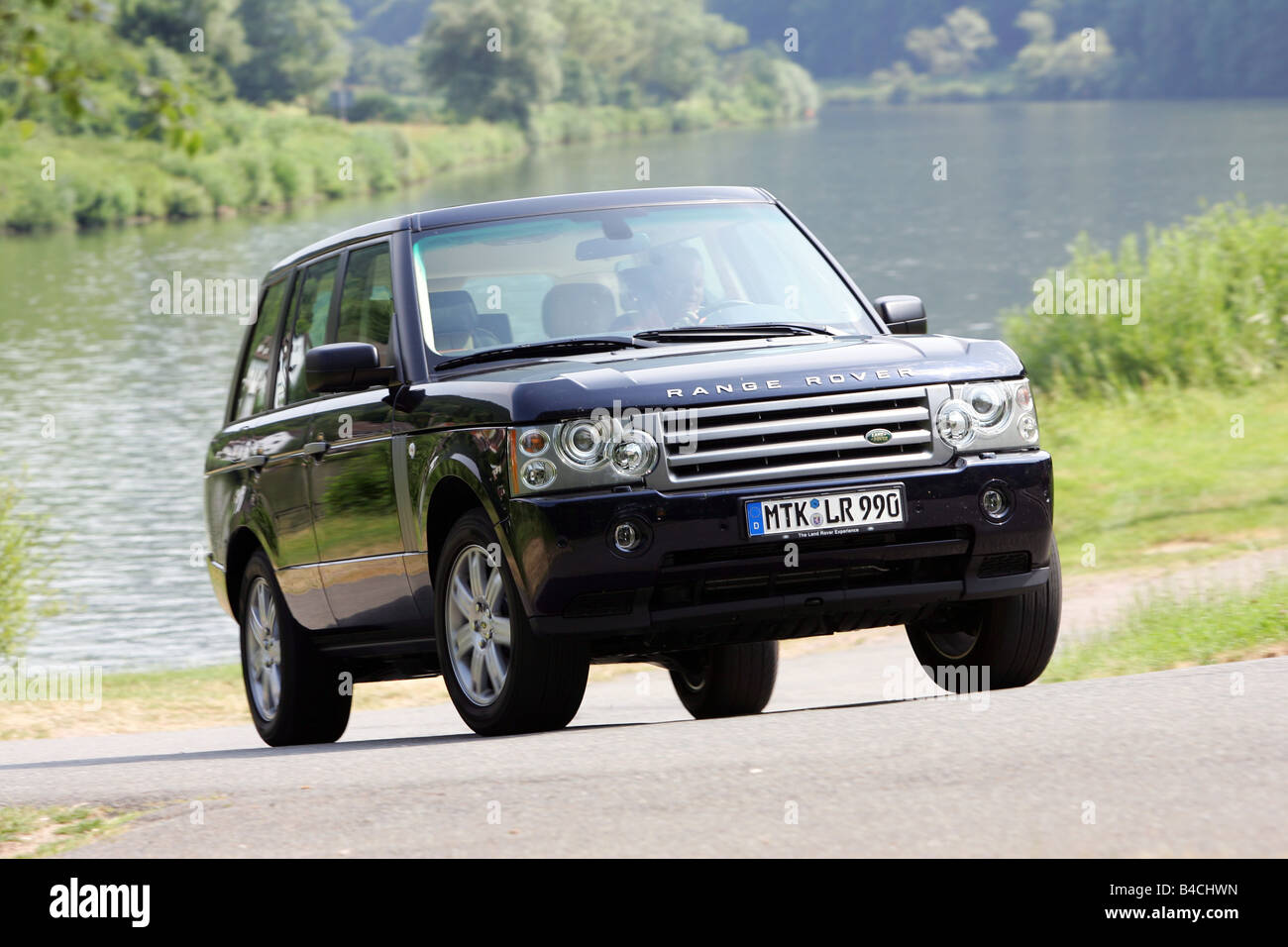 Land Rover Range Rover Sport, black, model year 2002-, driving, diagonal  from the front, frontal view, country road Stock Photo - Alamy