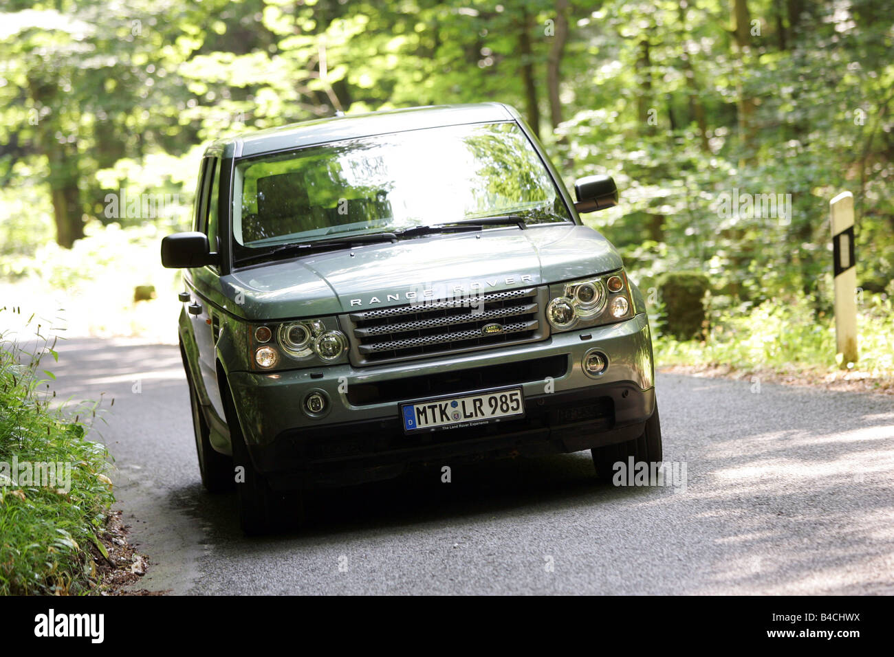 Land Rover Range Rover Sport V8, green-metallic, model year 2005-, diagonal from the front, frontal view, country road Stock Photo - Alamy