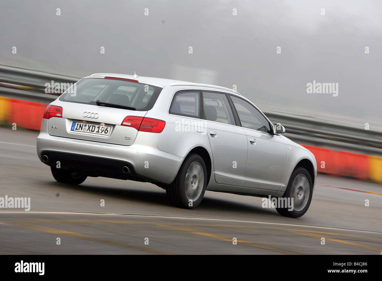 Audi A6 Avant 4.2 Quattro, model year 2005-, silver, driving, diagonal from  the back, rear view, Test track Stock Photo - Alamy