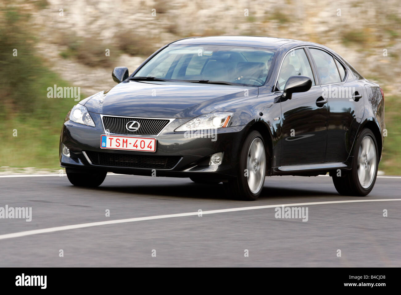 Lexus IS 220d, model year 2005, black, driving, diagonal from the