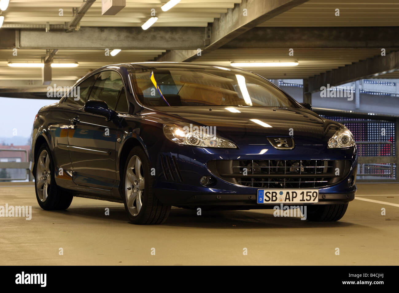 Peugeot 407 Coupe V6 HDi FAP 205, model year 2005-, dark blue, standing, upholding, diagonal from the front, frontal view, parki Stock Photo