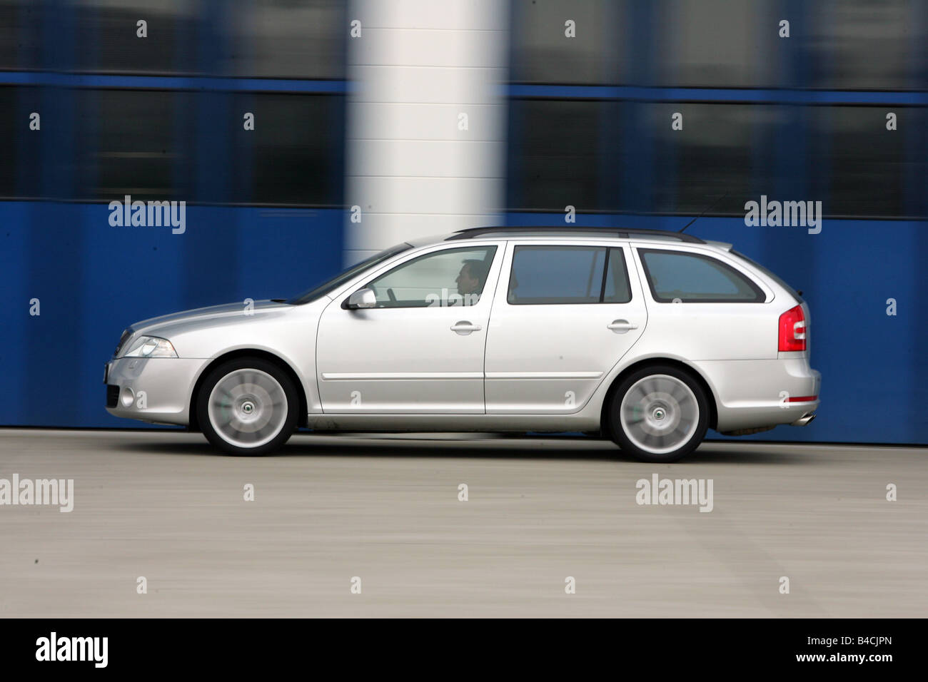 Skoda Octavia RS Combi, model year 2005-, silver, driving, side view, City Stock Photo