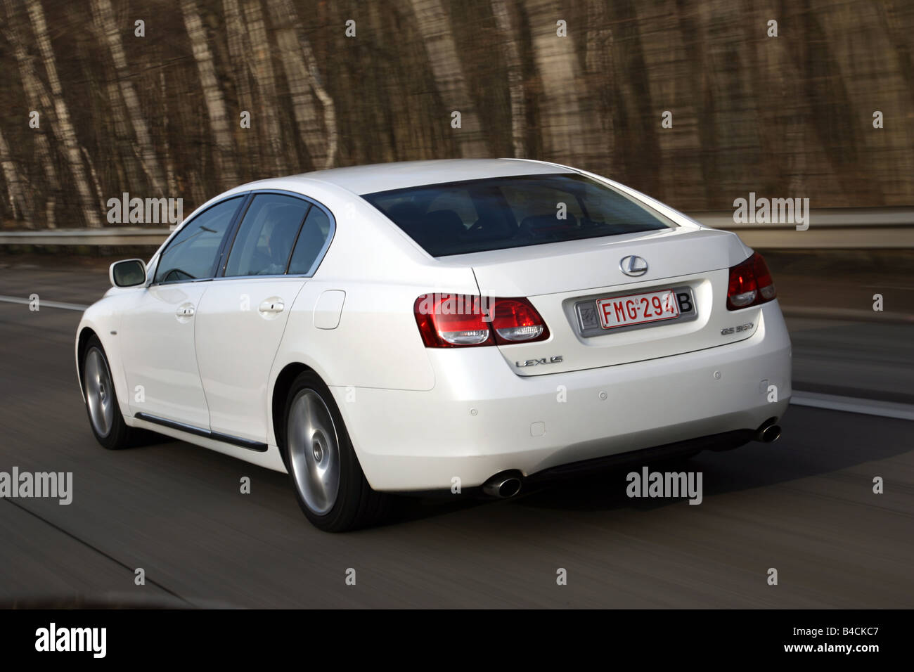 Lexus GS 540 h, model year 2006-, white, driving, diagonal from the back, rear view, country road, Hybrid model, Hybrid , Hybrid Stock Photo
