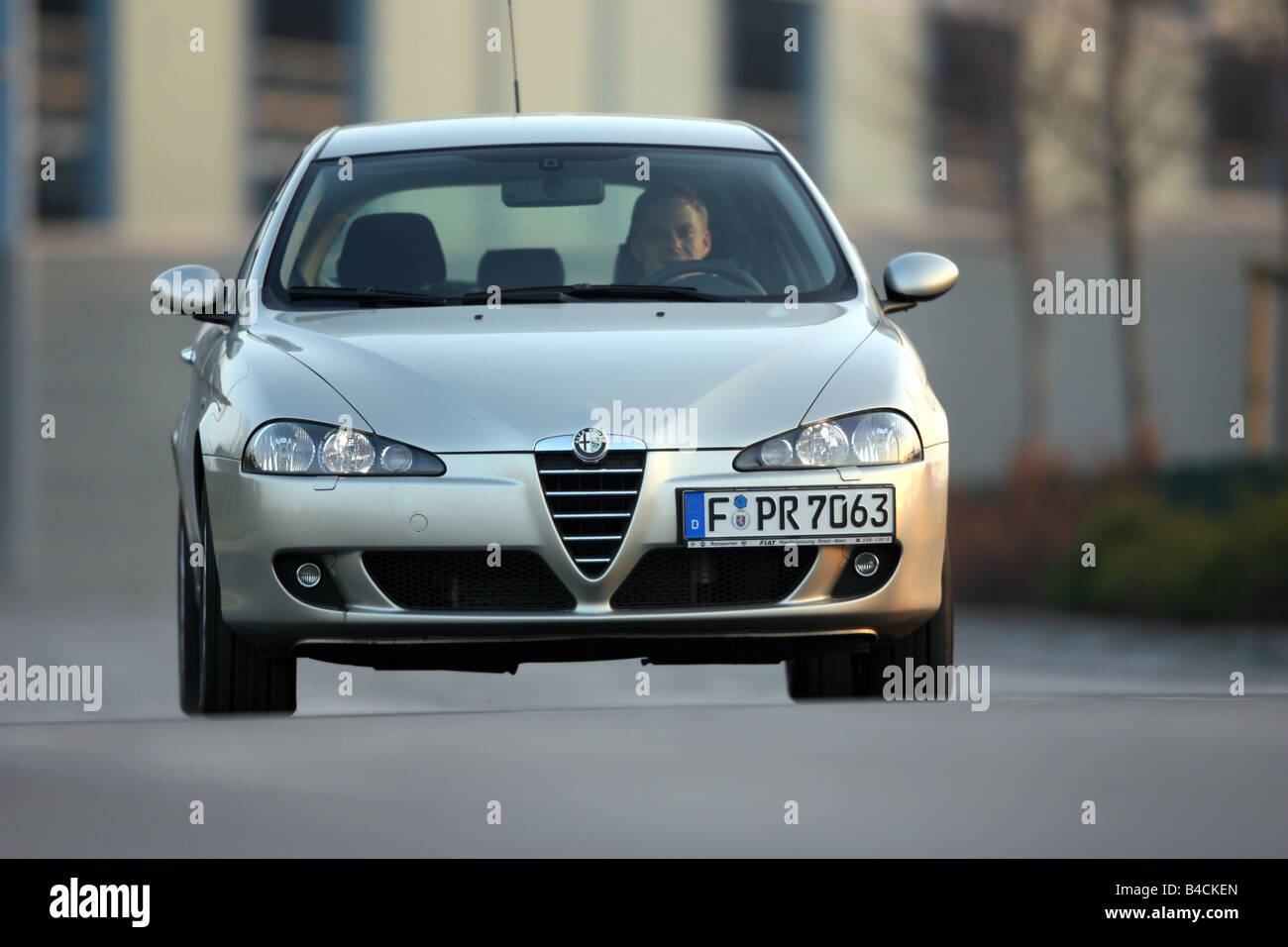 Alfa Romeo 147 1.9 JTD 16 V Distinctive, model year 2004-, silver, driving, frontal view, City Stock Photo