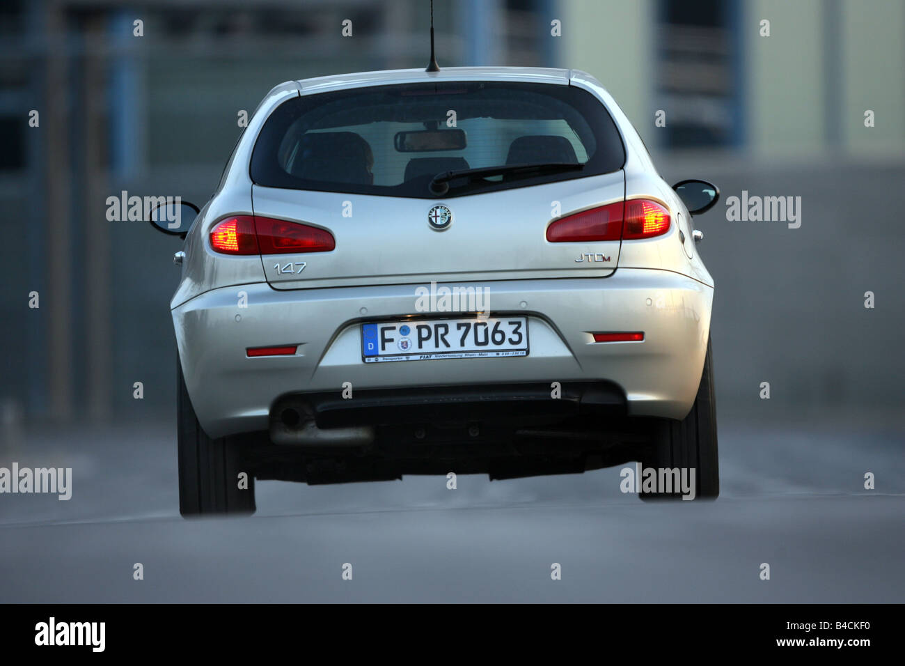 Alfa Romeo 147 1.9 JTD 16 V Distinctive, model year 2004-, silver, standing, upholding, rear view, City Stock Photo