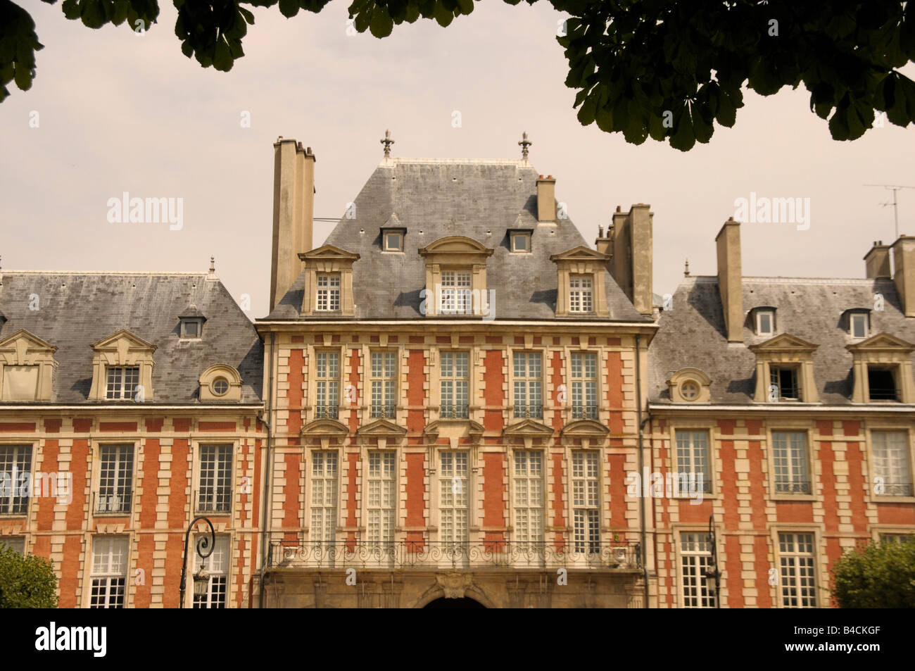 typical building at the square Place des Vosges in Paris France Stock Photo