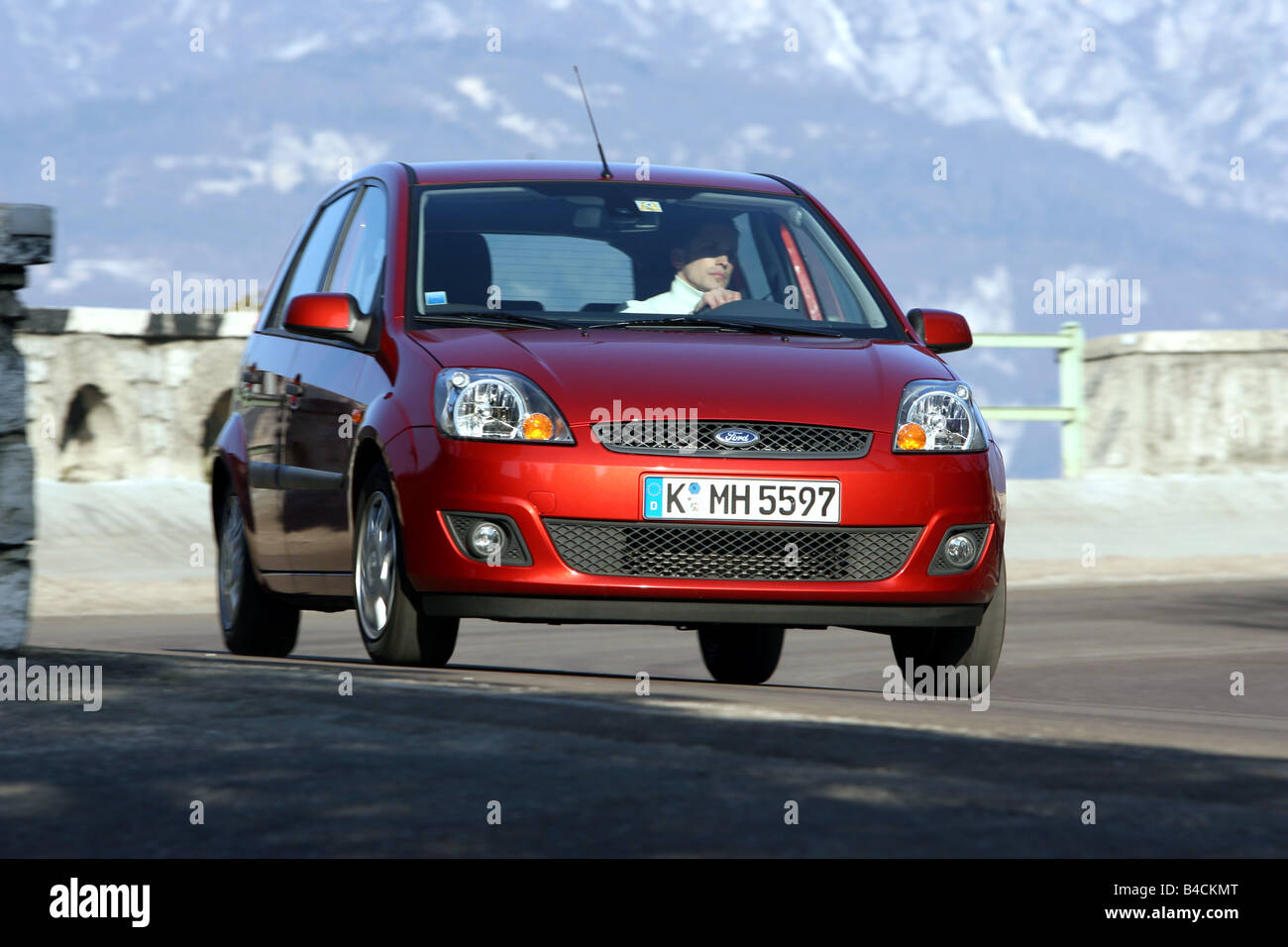Ford Fiesta 1 4 16v Model Year 05 Rust Red Driving Diagonal Stock Photo Alamy