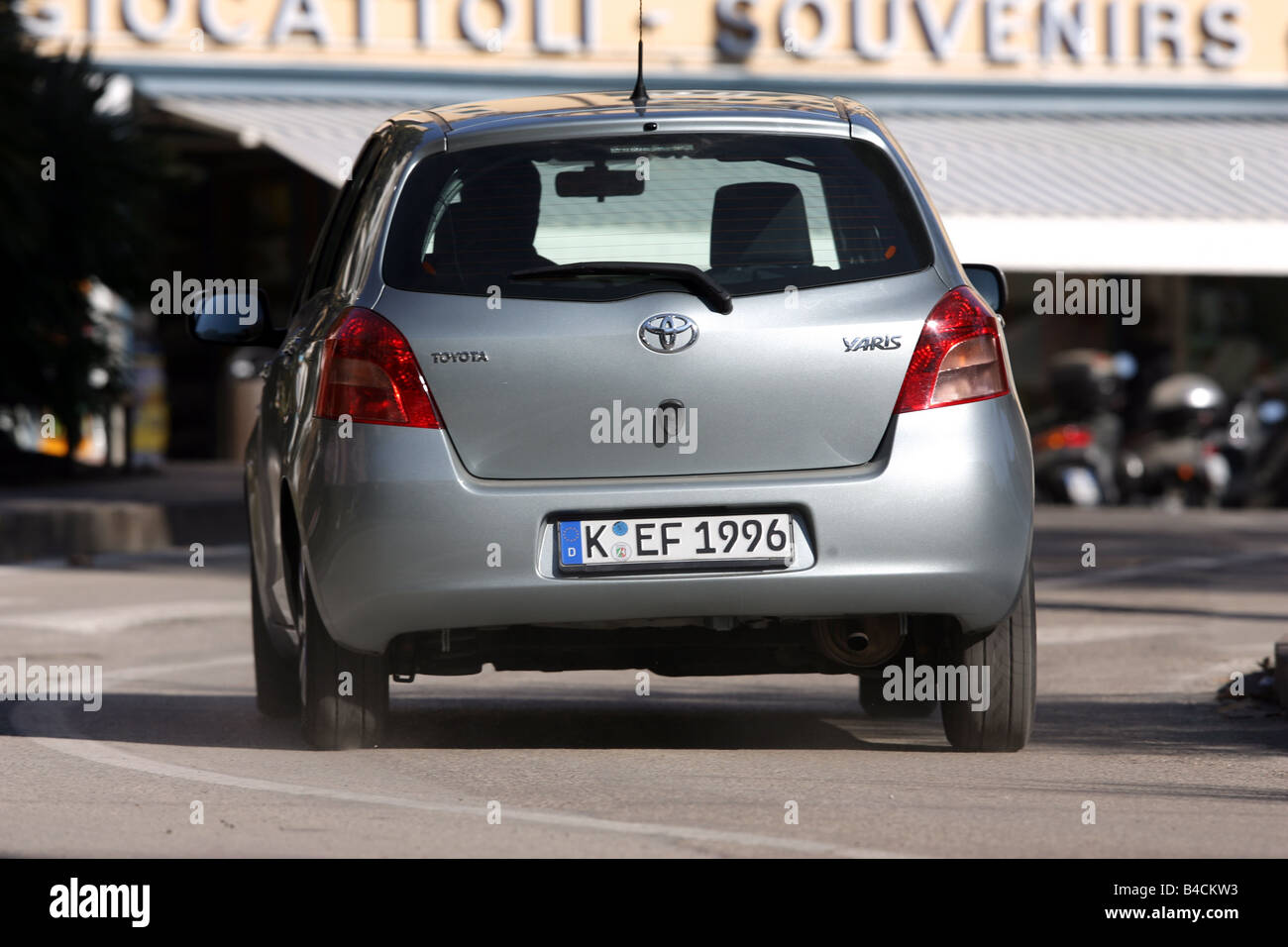 Toyota Yaris 1.3 WT-i, model year 2005-, silver, driving, diagonal from the back, rear view, City Stock Photo