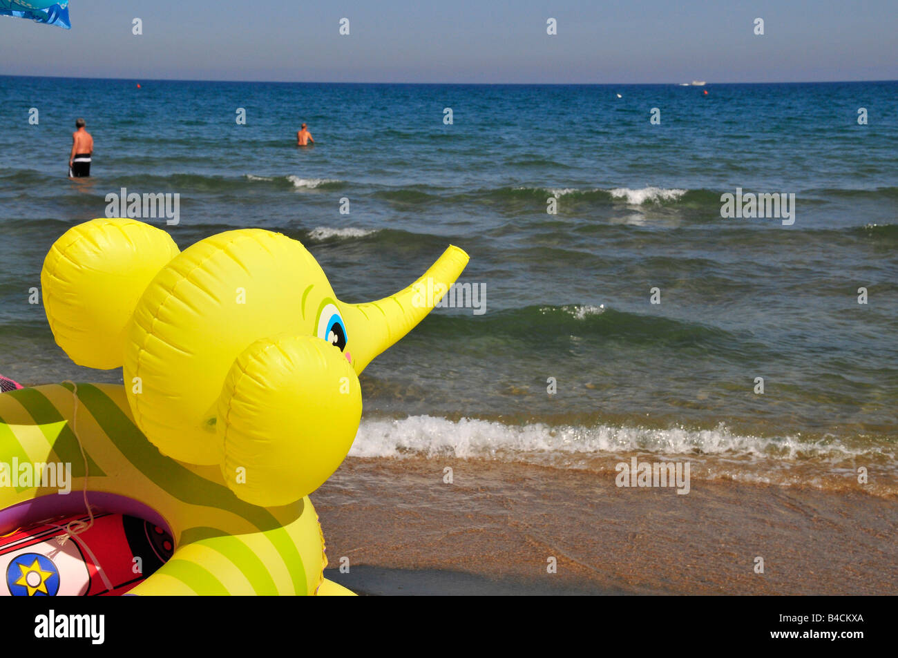 inflatable elephant toy by the sea Stock Photo