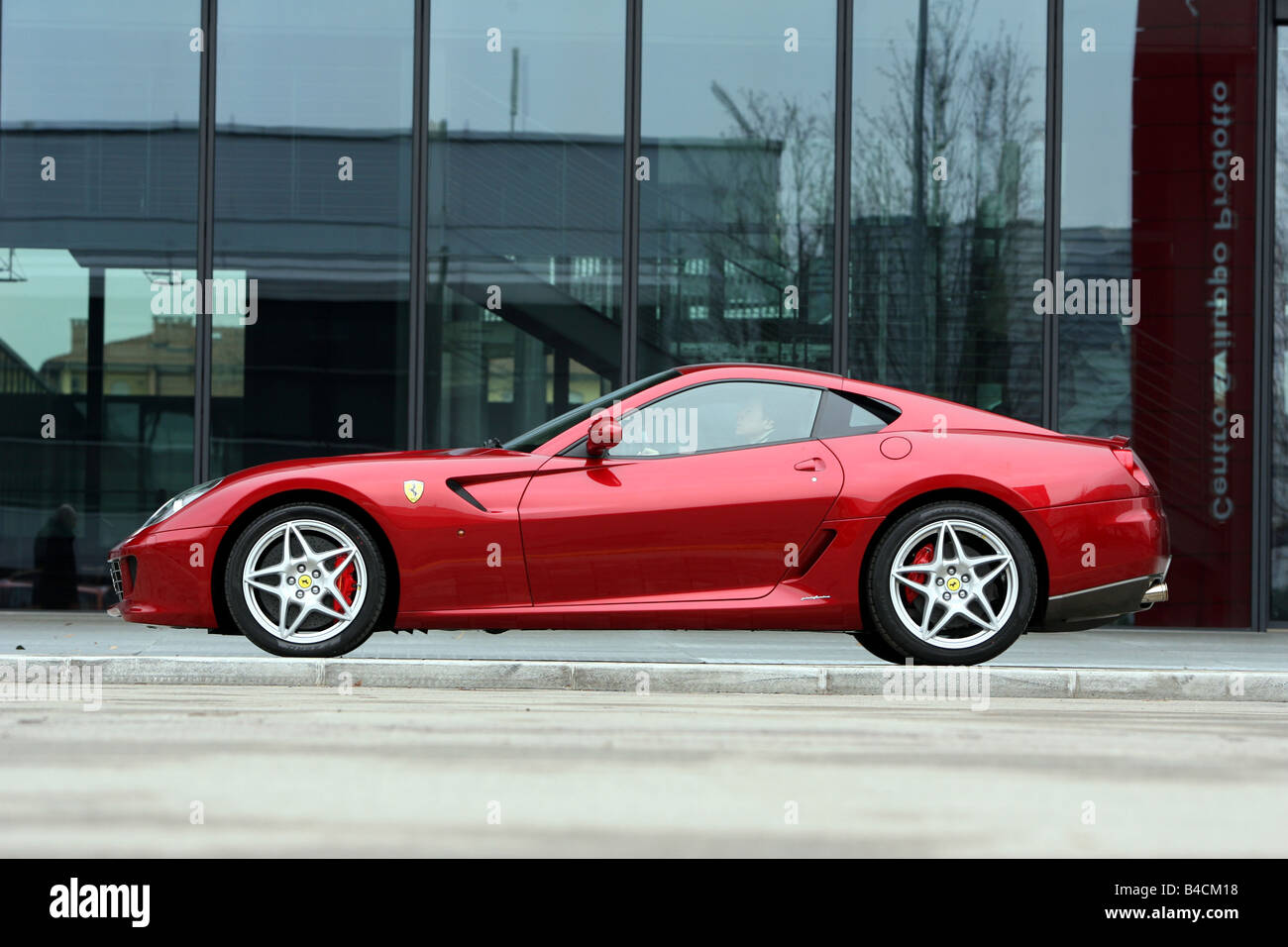 Ferrari 599 GTB Fiorano, red, model year 2006-, standing, upholding, side view, City Stock Photo