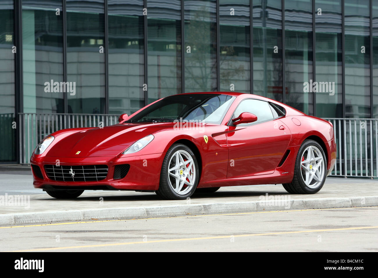 Ferrari 599 GTB Fiorano, red, model year 2006-, standing, upholding, diagonal from the front, frontal view, side view, City Stock Photo