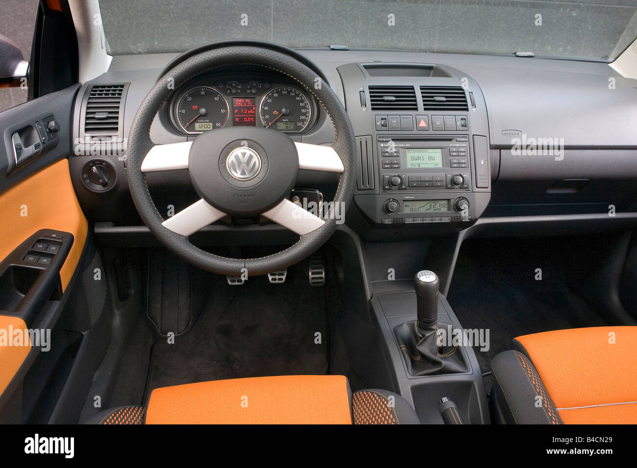 VW Volkswagen Cross Polo 1.4 TDI, model year 2006-, orange , interior view,  Interior view, Cockpit, technique/accessory, accesso Stock Photo - Alamy