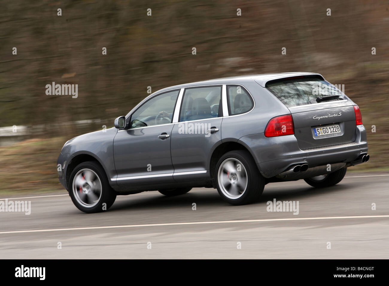 Porsche Cayenne Turbo S Model Year 06 Silver Anthracite Driving Diagonal From The Back Rear View Side View Country Roa Stock Photo Alamy
