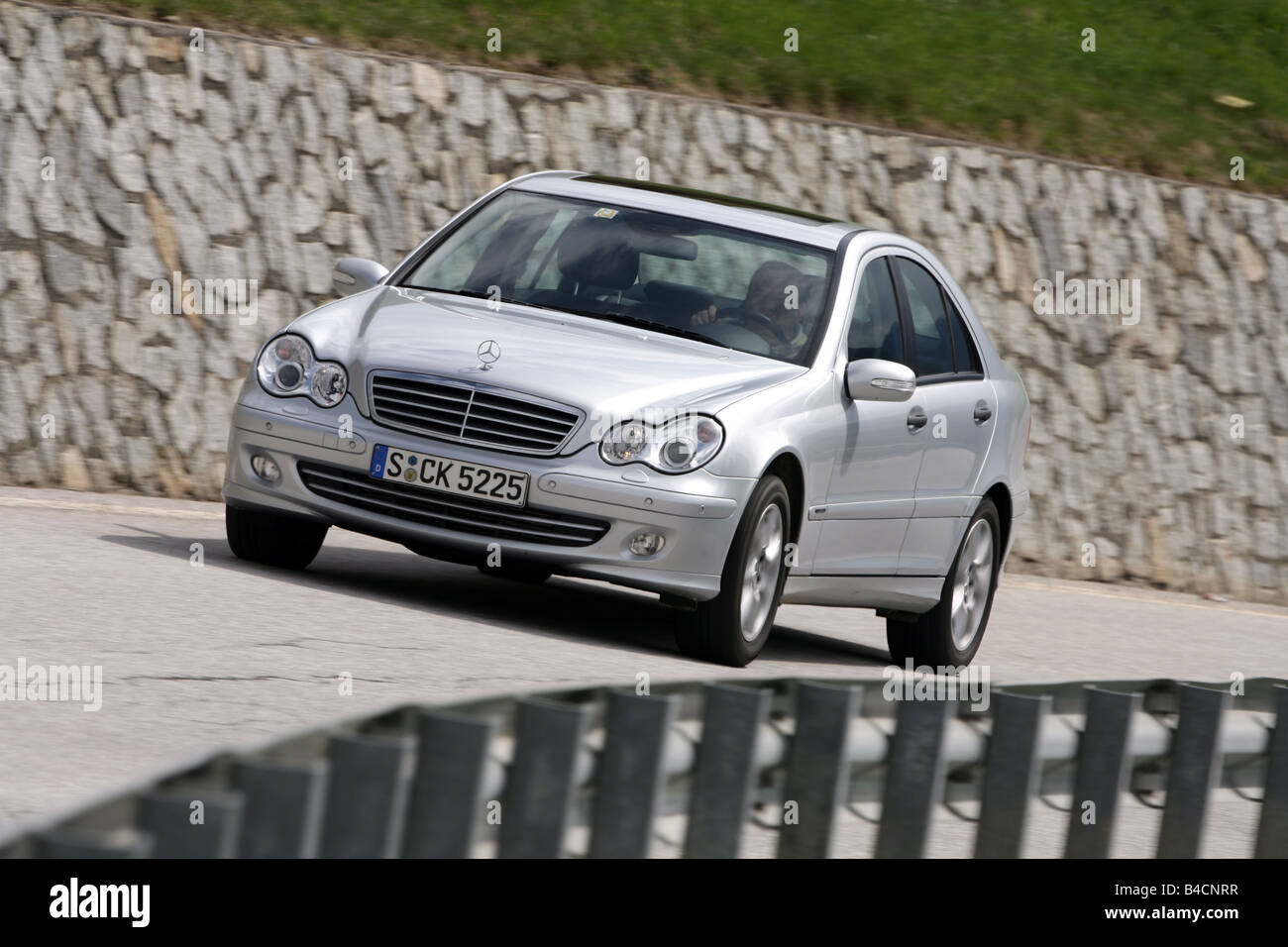 Mercedes C 220 CDI, model year 2005-, silver, driving, diagonal from the  front, frontal view, country road Stock Photo - Alamy