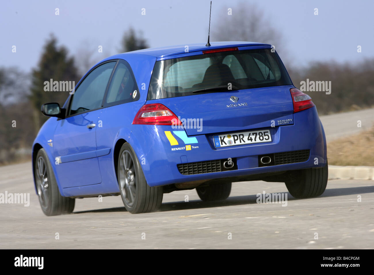 Renault Megane 2.0 16V Turbo, model year 2006-, blue moving, diagonal from  the back, rear view, Test track Stock Photo - Alamy