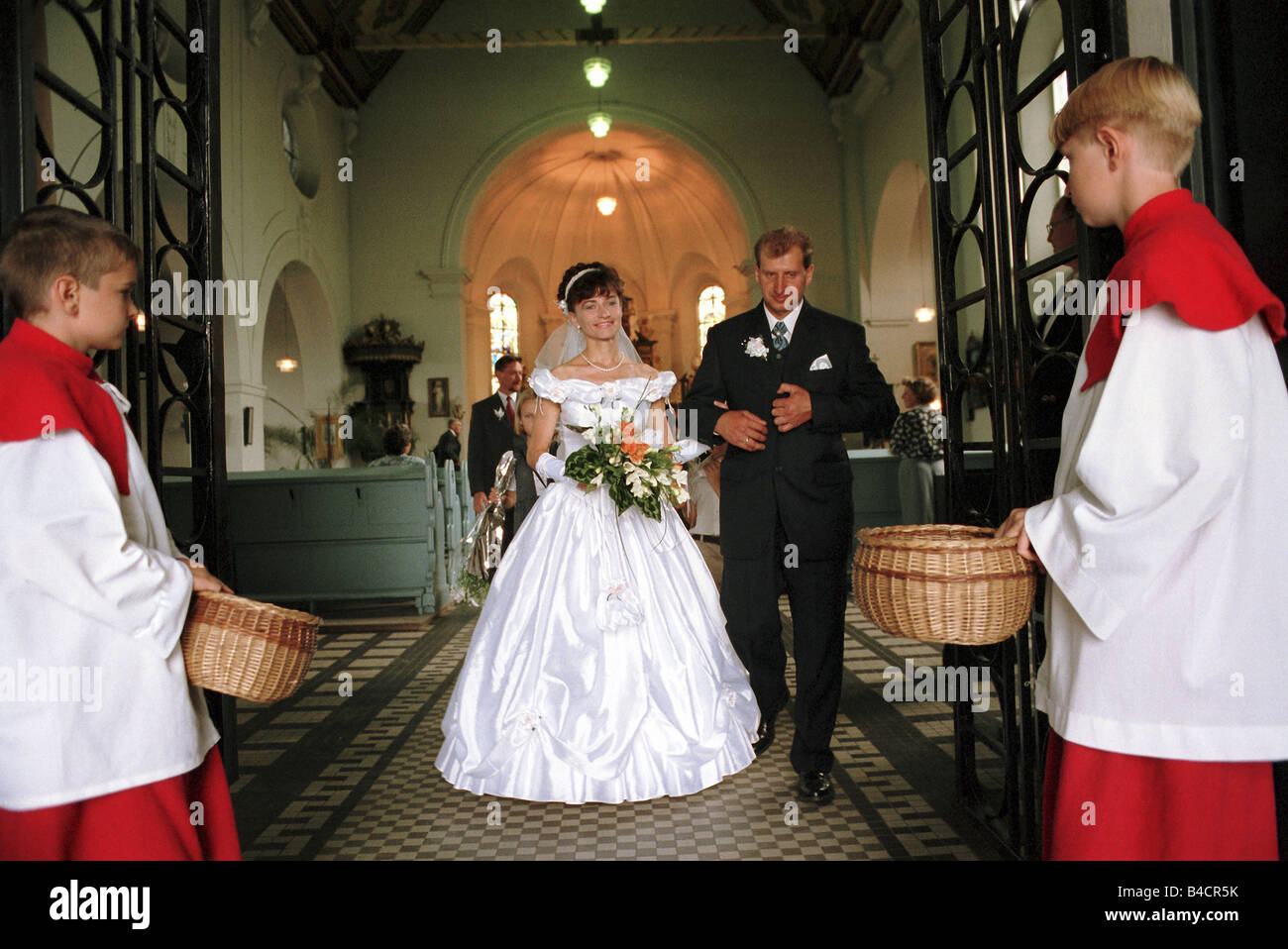 Newlyweds after the church wedding, Raciborz, Poland Stock Photo
