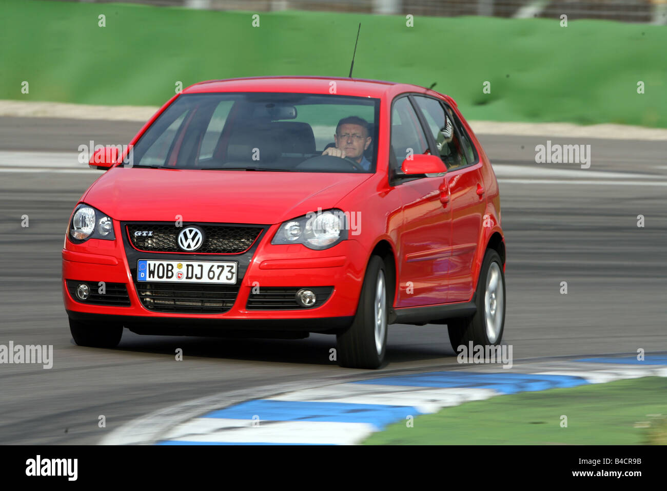 VW Volkswagen Polo GTI, model year 2005-, red, driving, diagonal from the  front, frontal view, test track Stock Photo - Alamy
