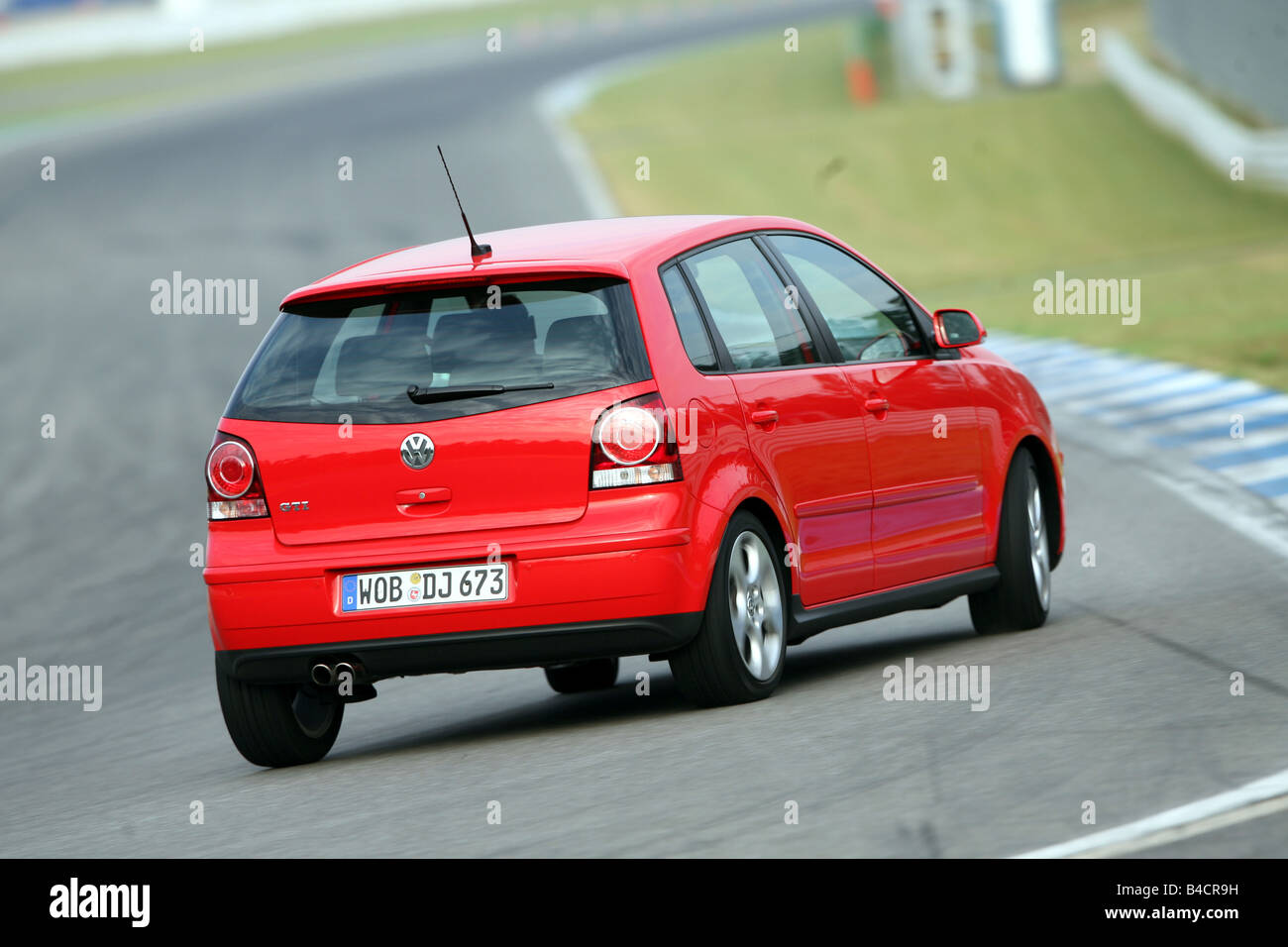 VW Volkswagen Polo GTI, model year 2005-, red, driving, diagonal from the  back, rear view, test track Stock Photo - Alamy